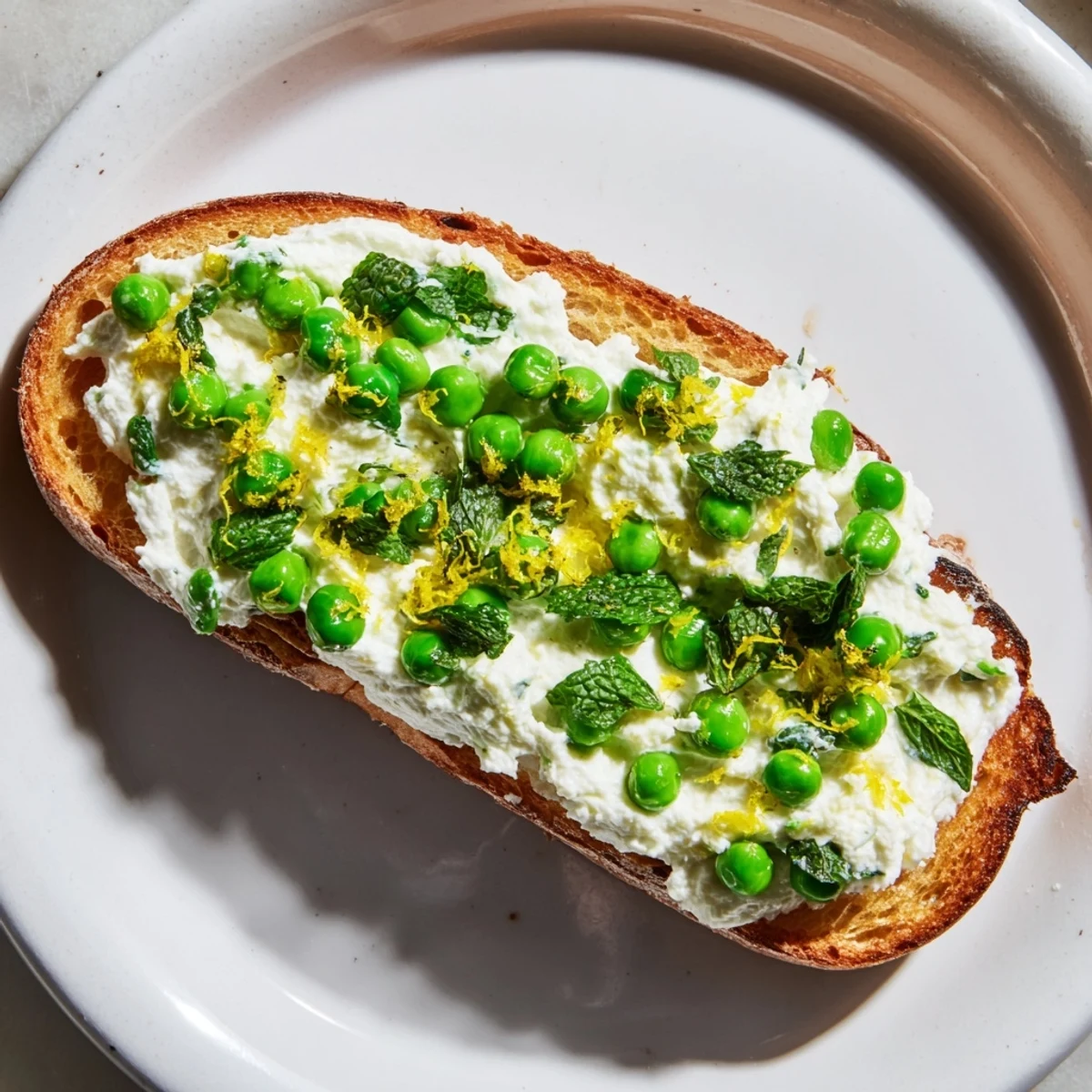 Pepper Ricotta Toast Pea & Mint Ricotta Toast with Lemon Zest