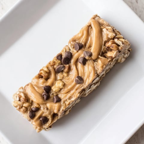 Chewy peanut butter banana oat bars, a delicious no-bake snack with visible banana and oats.