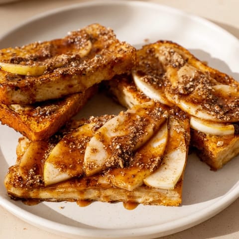 Steaming-hot Soft Crumb Apple Crisp, featuring bubbly apples perfect for serving with vanilla ice cream.