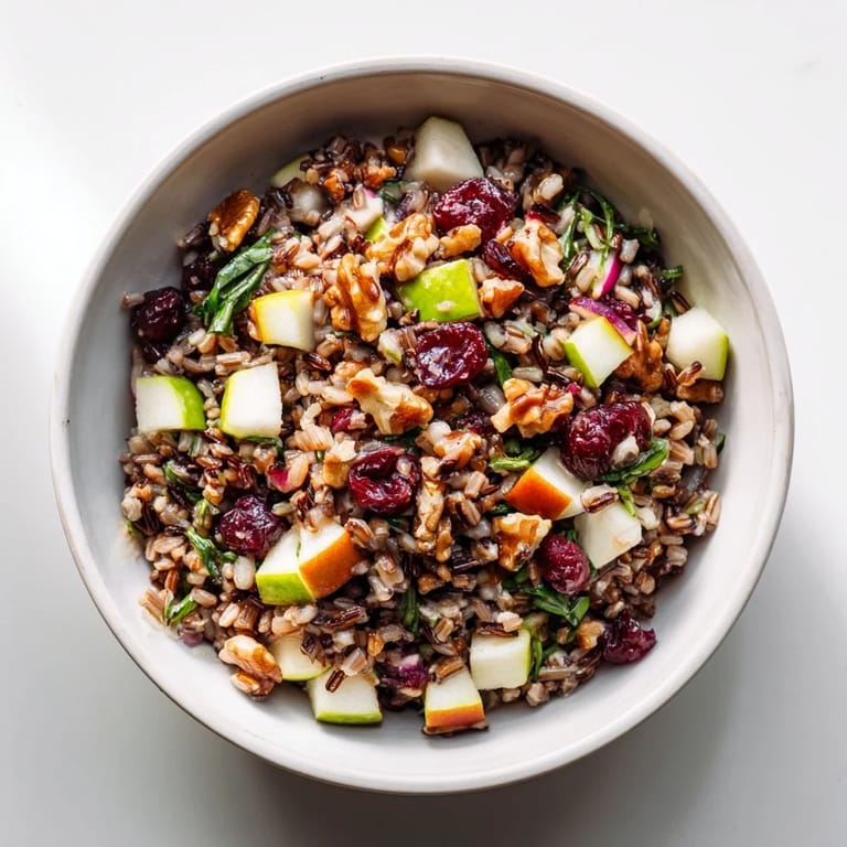 Vibrant Light Forest Wild Rice and Cranberry Salad with tart cranberries and toasted nuts.
