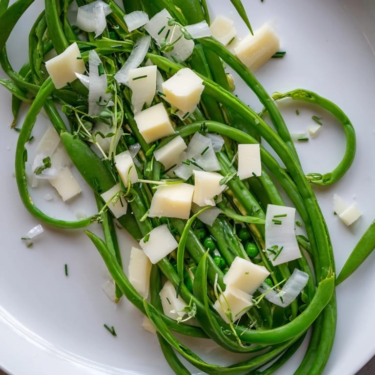 A beautiful serving of The English Ivy salad, with a sharp white cheddar cheese and fresh chives.