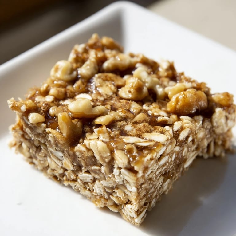 Warm, inviting image of fresh-baked maple cinnamon oatmeal bars, ideal for a sweet snack.