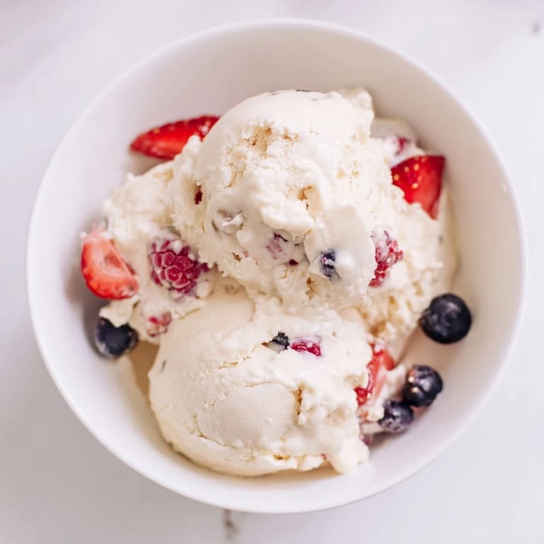 This smooth Cottage Cheese Ice Cream, blended with honey, shows a perfect swirl of frozen goodness.